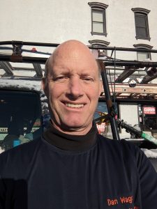 Dan Wagner in front of a work vehicle in Honesdale, PA